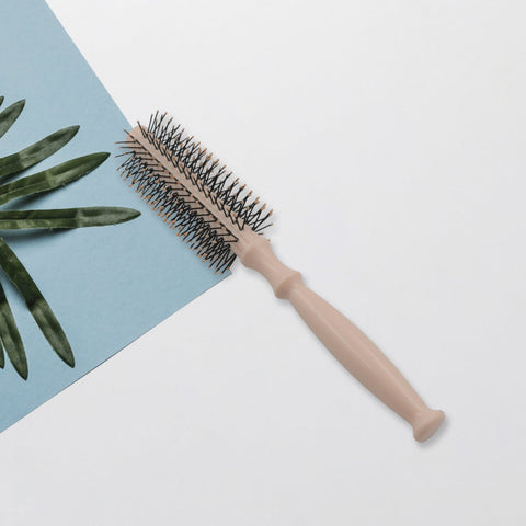 Hair styling brush with round design