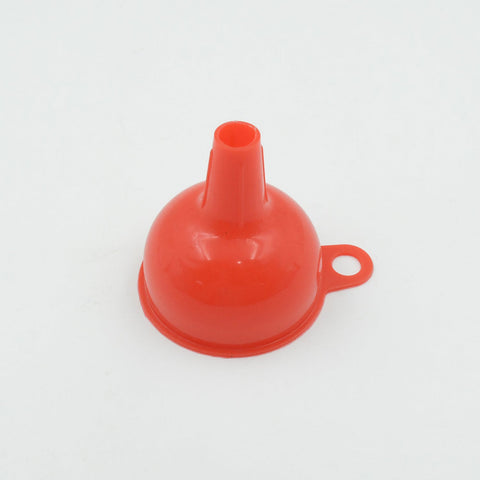 Silicone funnel in use for pouring liquids and grains