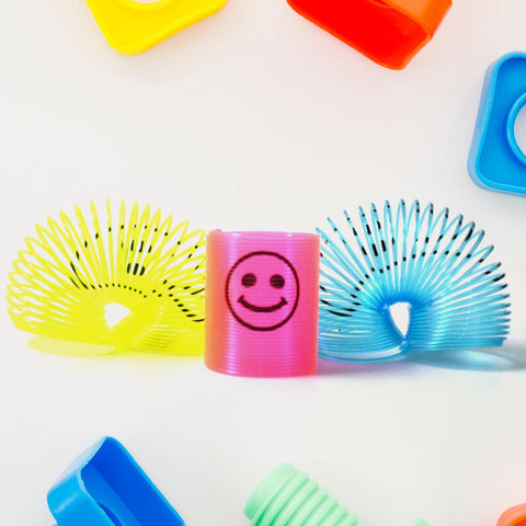 Multicolor Magic Smiley Spring, Spring Toys, Slinky, Slinky Spring Toy, Toy for Kids for Birthdays, Compact and Portable Easy to Carry (12 Pcs Set) - jugaad.shop