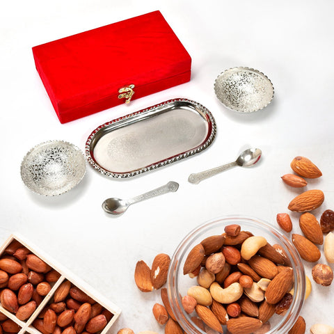 Silver plated brass tray set for serving.