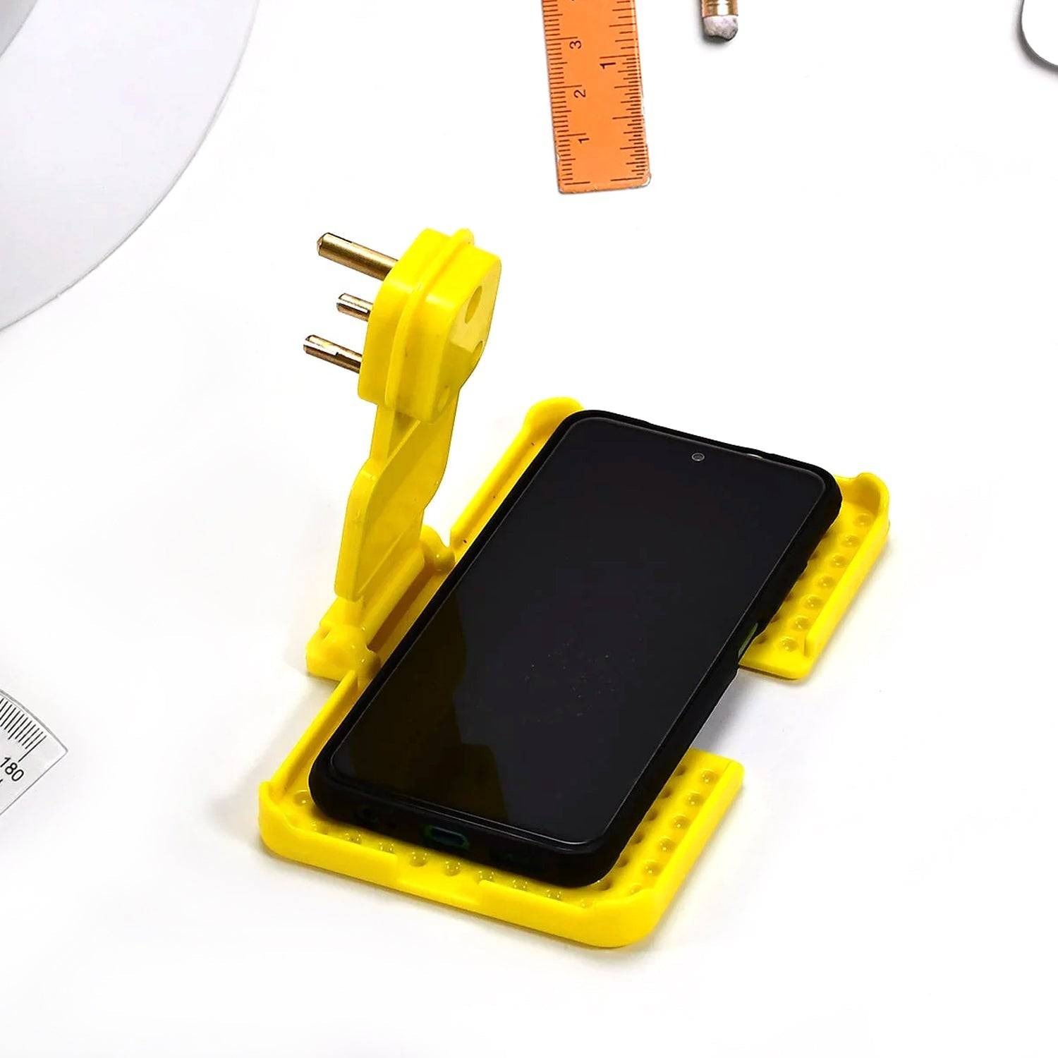 Multi-Purpose Wall Holder Stand for Charging Mobile, Just Fit in Socket and Hang (Mix Color / 1 pc) - jugaad.shop