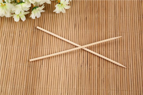 Bamboo skewers for grilling with a polished surface.