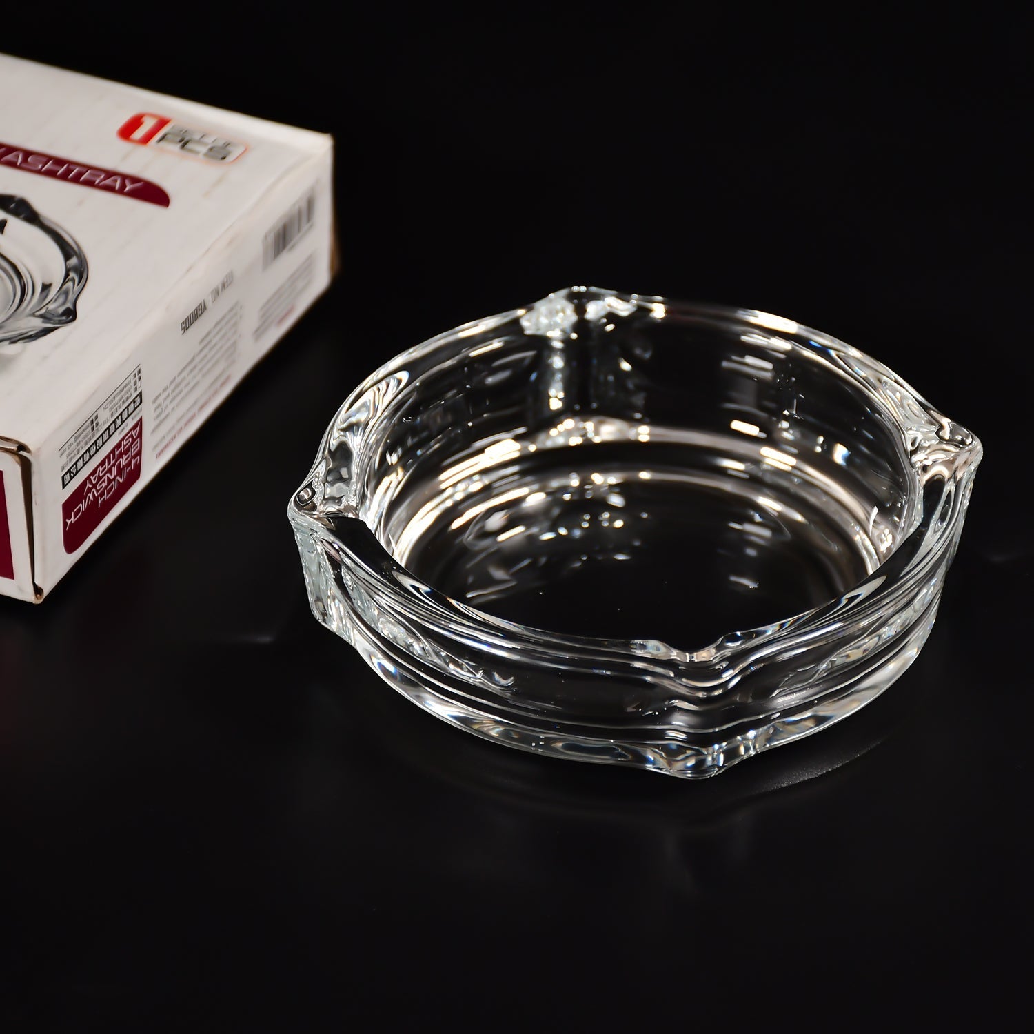 Crystal ashtray for cigars and cigarettes.